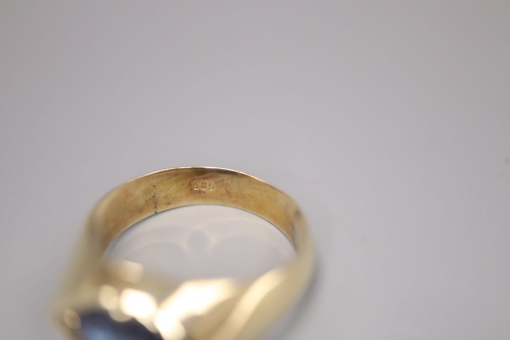 A 14ct gold and sapphire dress ring, size Q, gross 7.8 grams